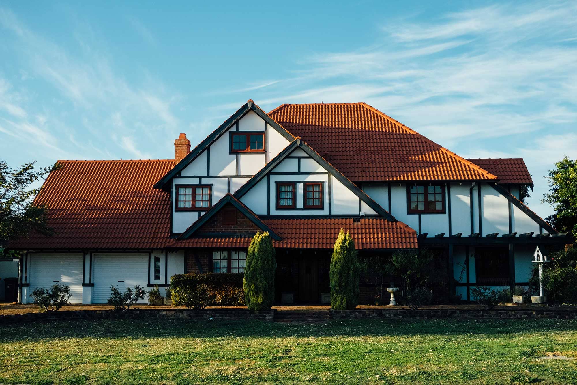 Private villa exterior with landscaped gardens