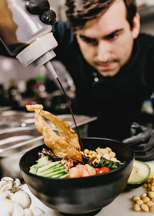 Chef preparing a signature dish
