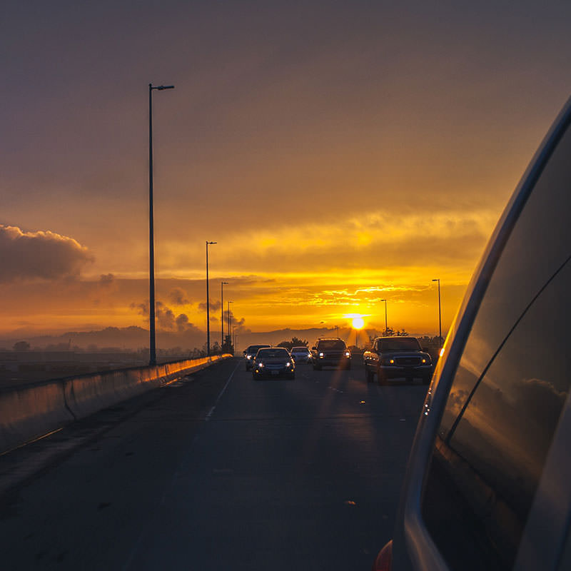 Warm sunset over highway carousel slide