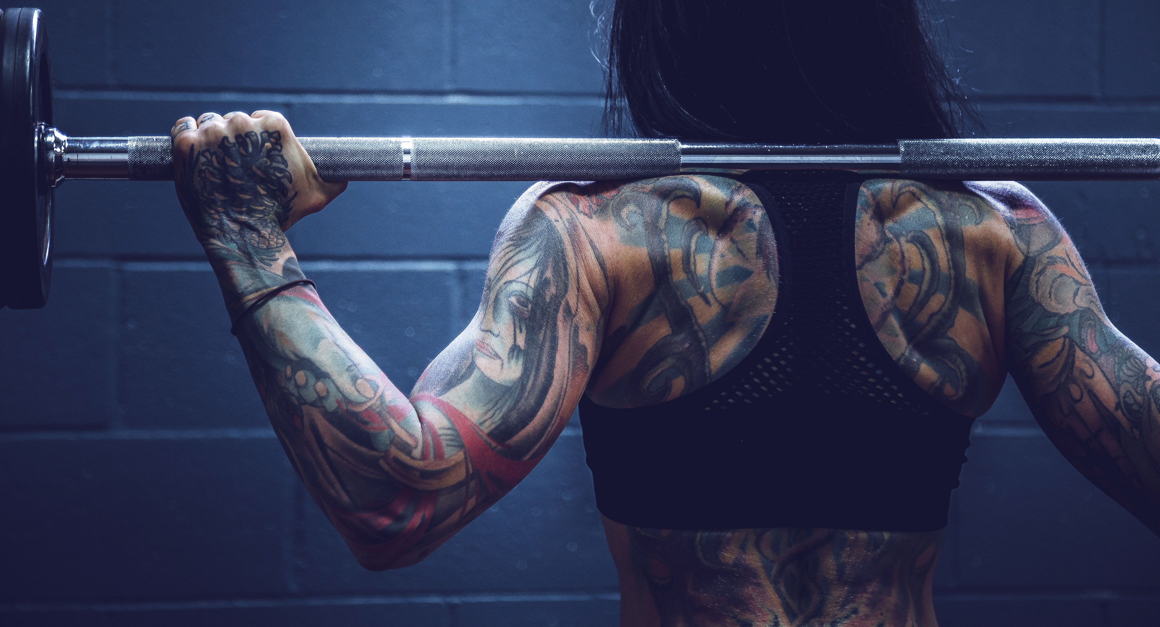 Athletes training in a modern fitness club