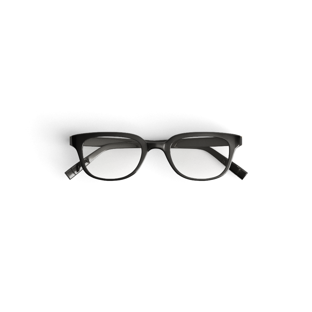 Pair of reading glasses on the desk